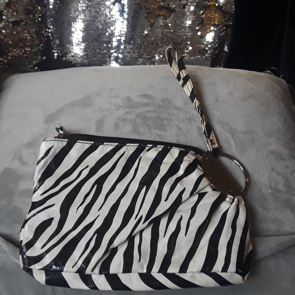 Zebra striped wrist dinning or clubbing purse New